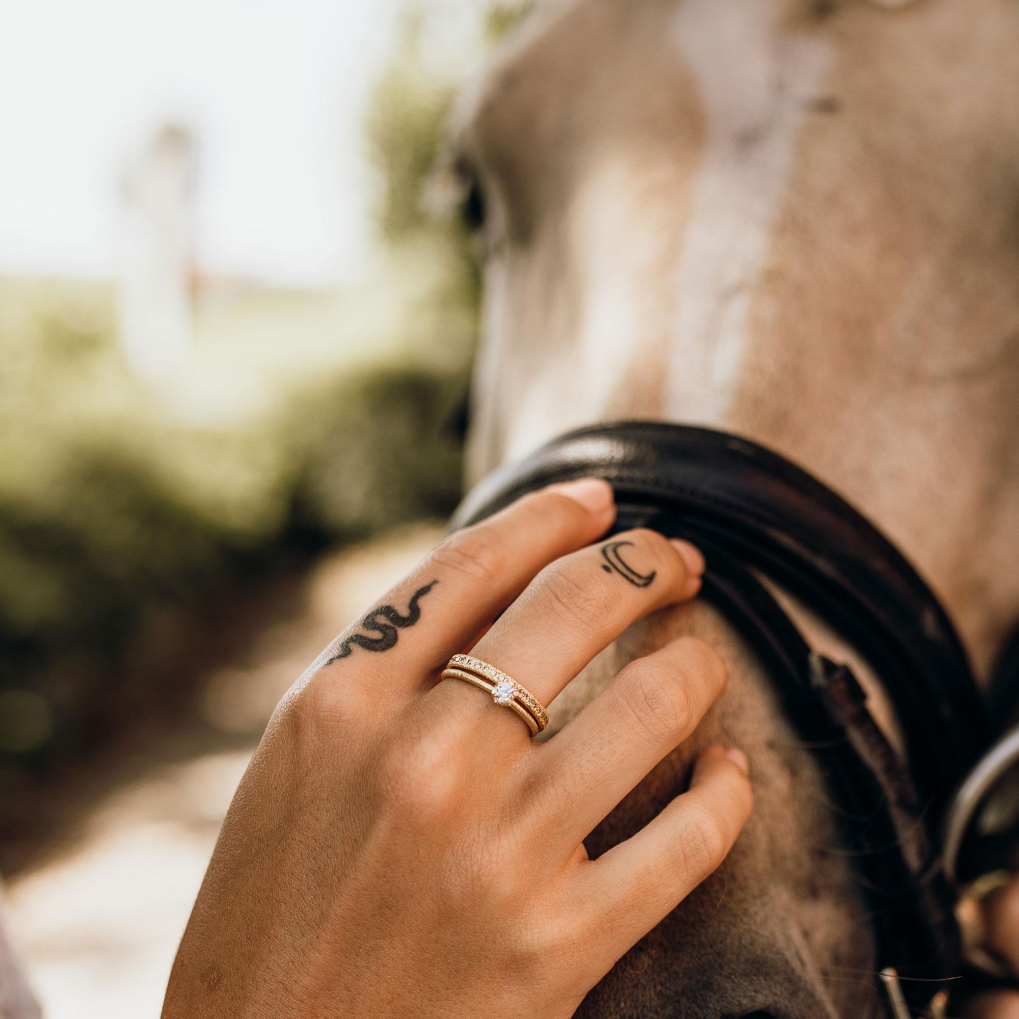 Ring "Scarlett" in white gold with a brilliant-cut diamond 0.19ct