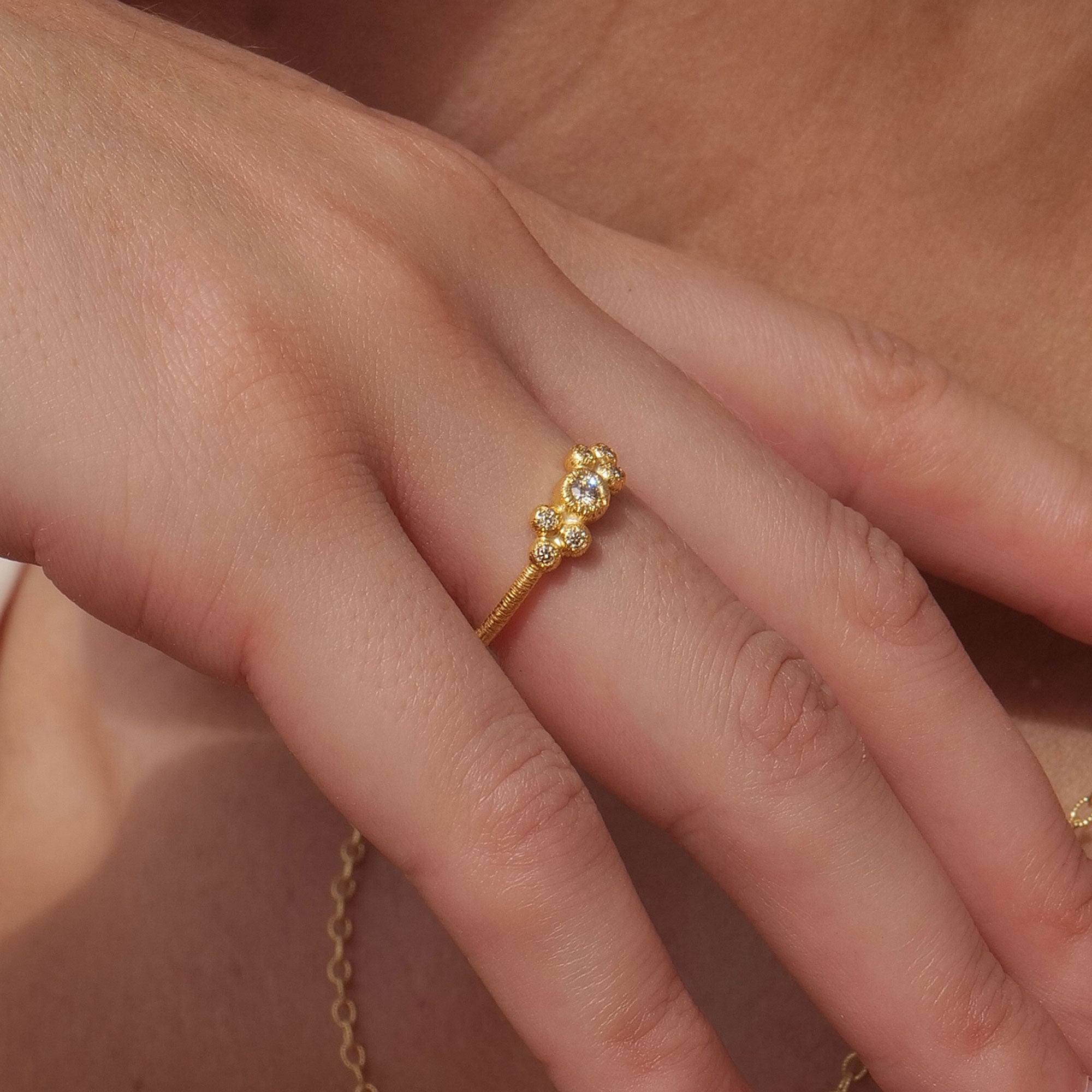 Ring "Kassiopeia" in yellow gold with 7 brilliant-cut diamonds